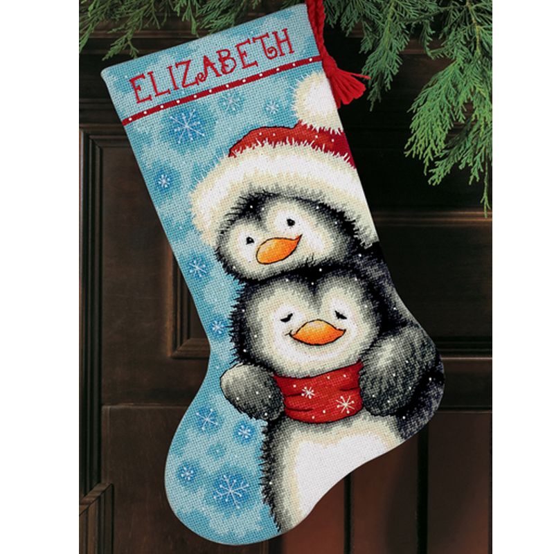 Points de croix : chaussette de Noël à réaliser, pingouins calins. Réf 57/95/D71-09144